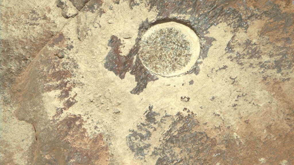 Persevering rover on Mars discovers something 'never before' under a rock