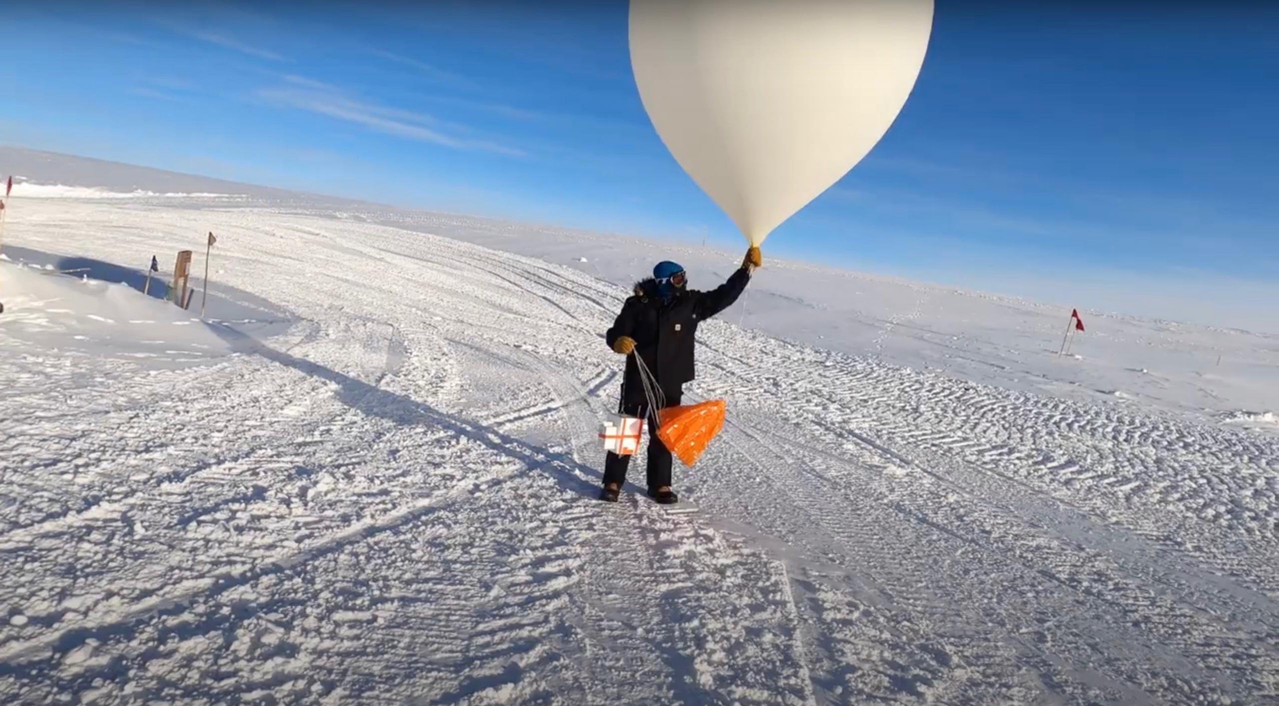 A scientist launched a weather balloon carrying an ozone probe from the Antarctic Station in March 2021. Credit: NOAA Global Monitoring Laboratory