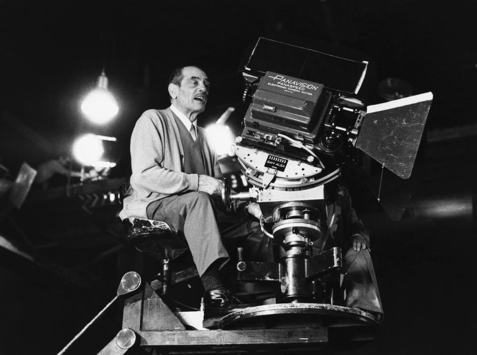 Film director Luis Buñuel on film camera (Photo by �� John Springer Collection / CORBIS / Corbis via Getty Images)