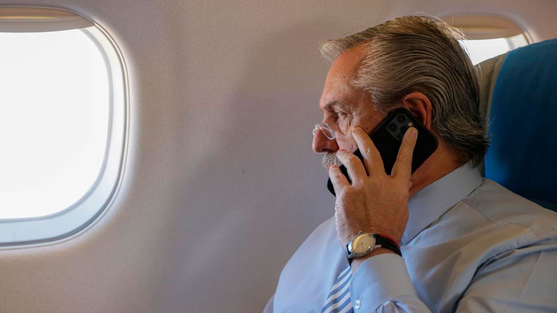 Alberto Fernandez talks on the phone during his trip to Brazil.