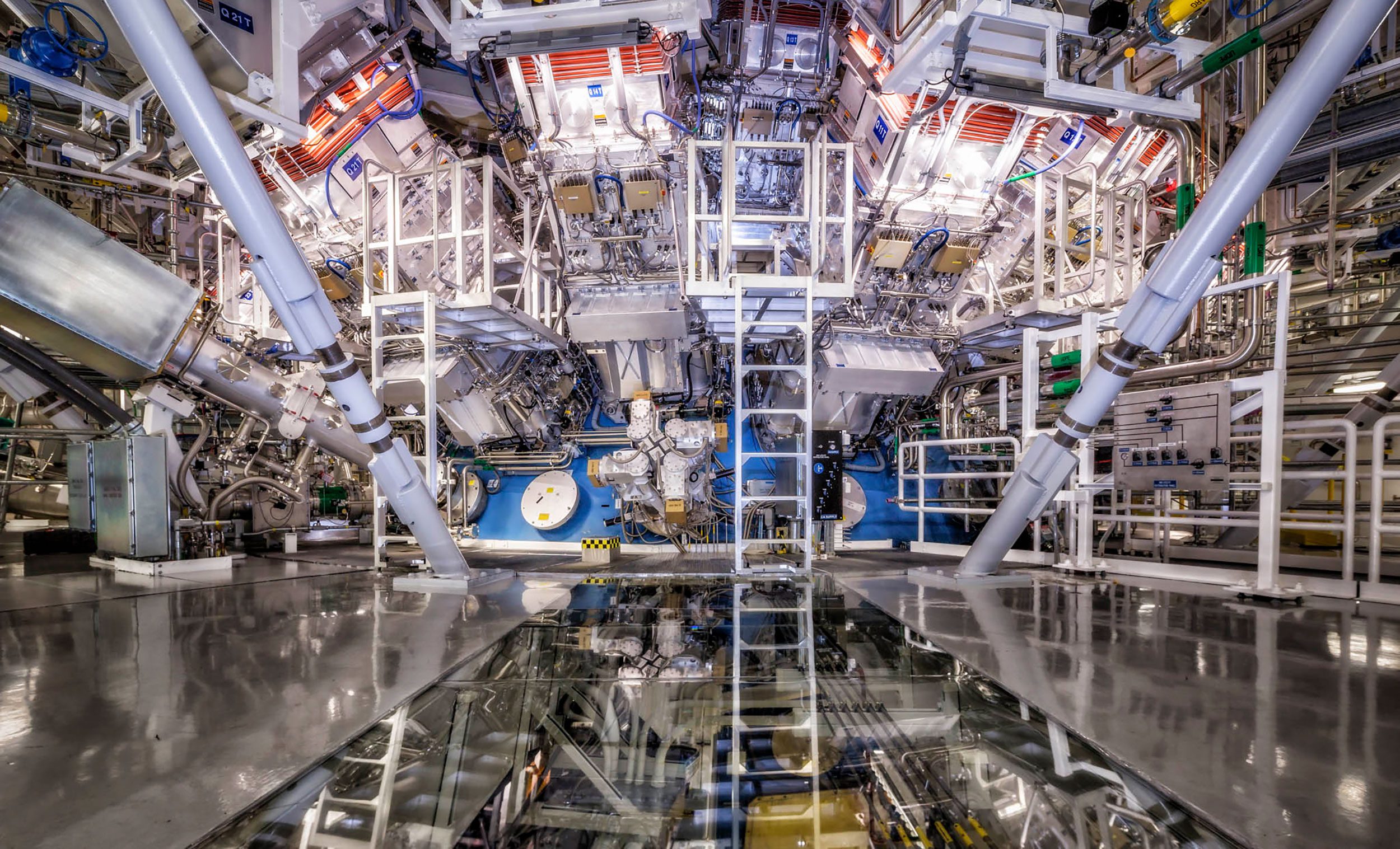 The magic is the target chamber at the National Ignition Facility at Lawrence Livermore National Laboratory in California: temperatures of 100 million degrees and pressures extreme enough to press the target to densities up to 100 times that of lead.  (Damien Jamieson/LLNL)